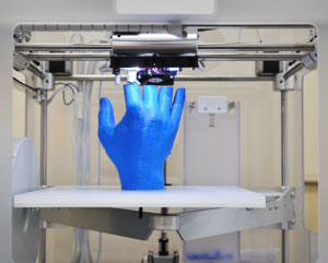 a 3D printer printing a hand