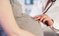 Doctor examining a pregnant woman