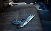 A gun in a car seat