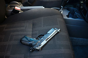 A gun in a car seat