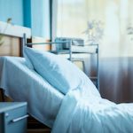side view of empty hospital bed