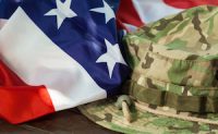 US flag with camouflage cap combat hat